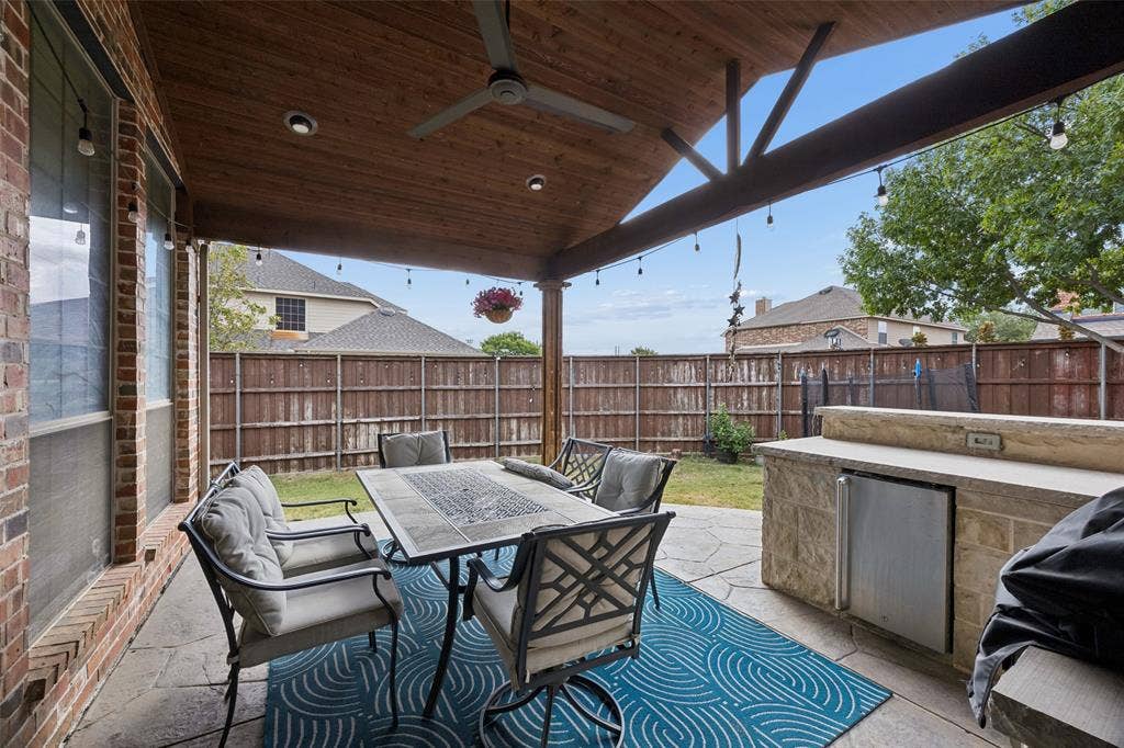 2865 Ridge View Road, Frisco, TX 75034 Covered patio featuring a wood-finish ceiling, recessed lighting, and an outdoor fan