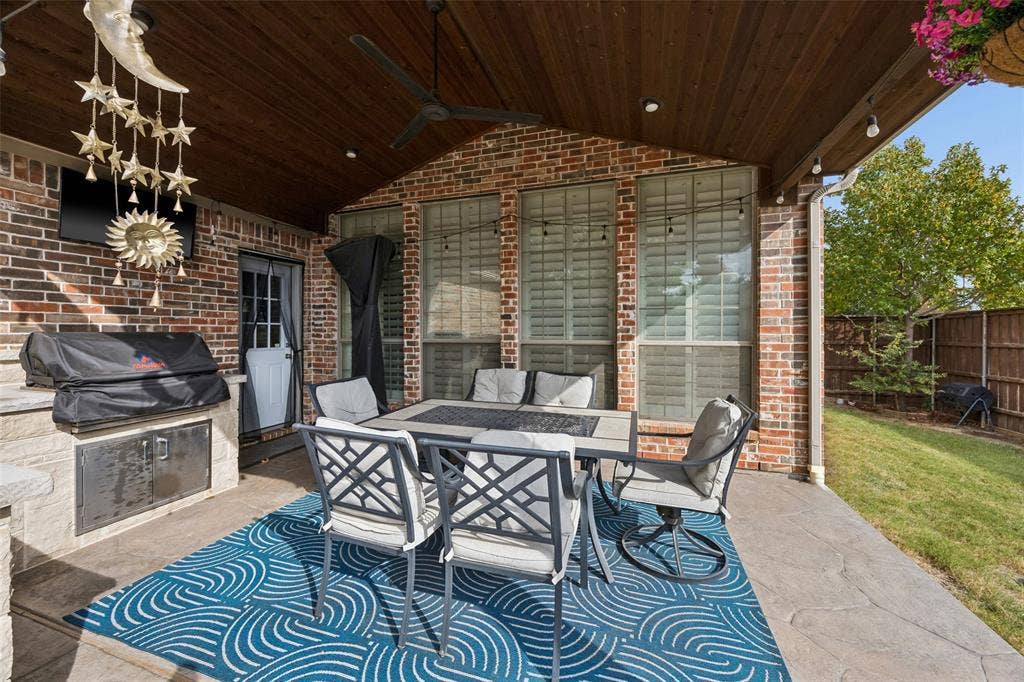 2865 Ridge View Road, Frisco, TX 75034 Covered patio featuring a wood-finish ceiling, ceiling fan, recessed lighting, and brick exterior