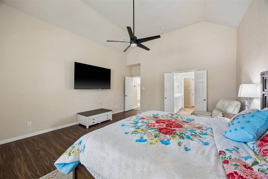 2865 Ridge View Road, Frisco, TX 75034 Vaulted ceiling with a ceiling fan, recessed lighting, wood-finish flooring, and double-door entryway