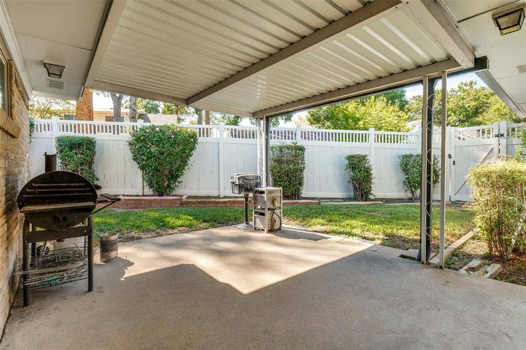 Covered patio featuring a concrete slab and direct access to the backyard