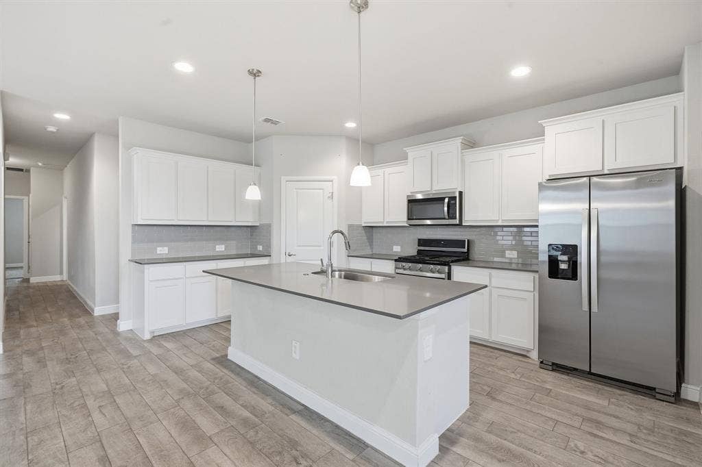 Tile Backsplash and Refrigerator Stays