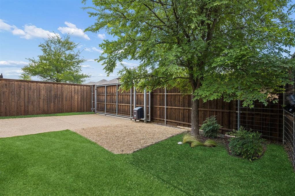 Back yard with rear entry electric gate