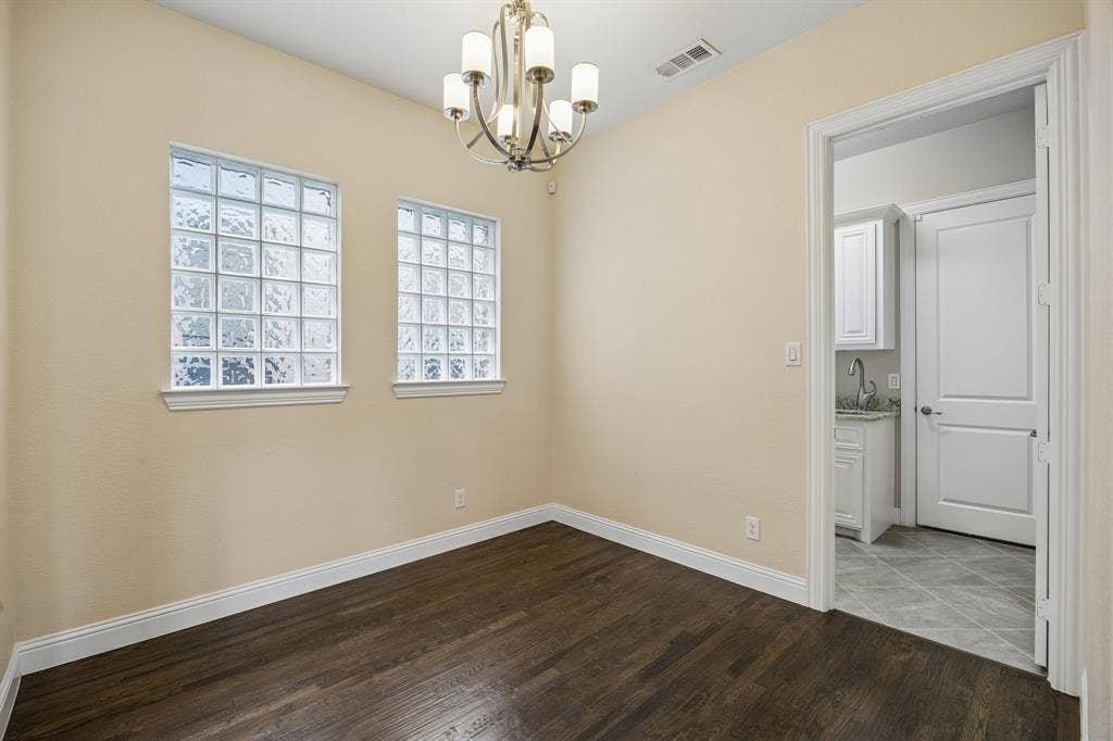 Breakfast area with hand scraped flooring