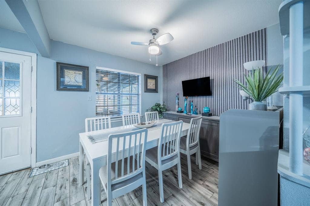 1938 Balla Way, Grand Prairie, TX 75051 Wood-finish flooring complementing a white door with decorative glass