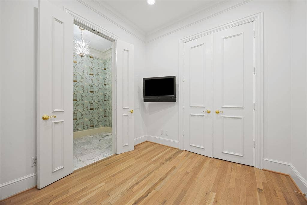 3535 Gillespie Street, #507, Dallas, TX 75219 Spacial den, office or guest room featuring french doors and a full closet