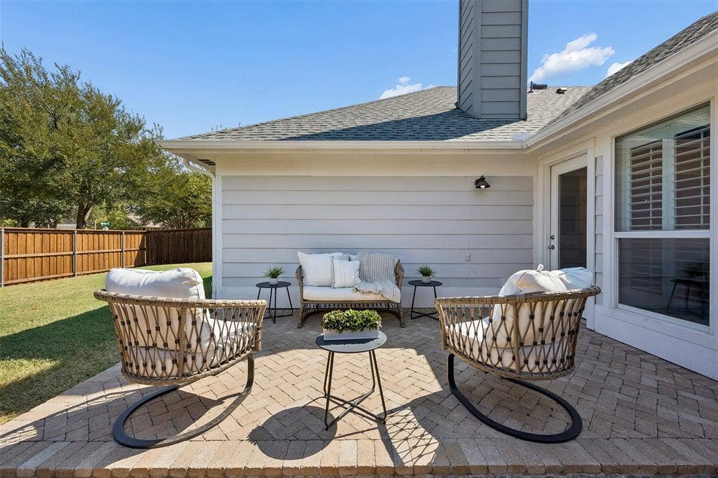 9828 Meadow Rue Drive, McKinney, TX 75072 Enjoy morning coffee, outdoor dinners or quiet evenings on the covered patio.