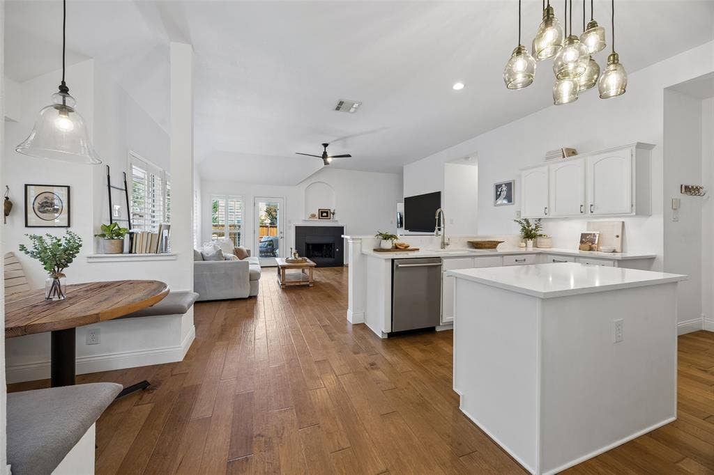 9828 Meadow Rue Drive, McKinney, TX 75072 The kitchen opens naturally to the family room, creating a wonderful space for gathering.