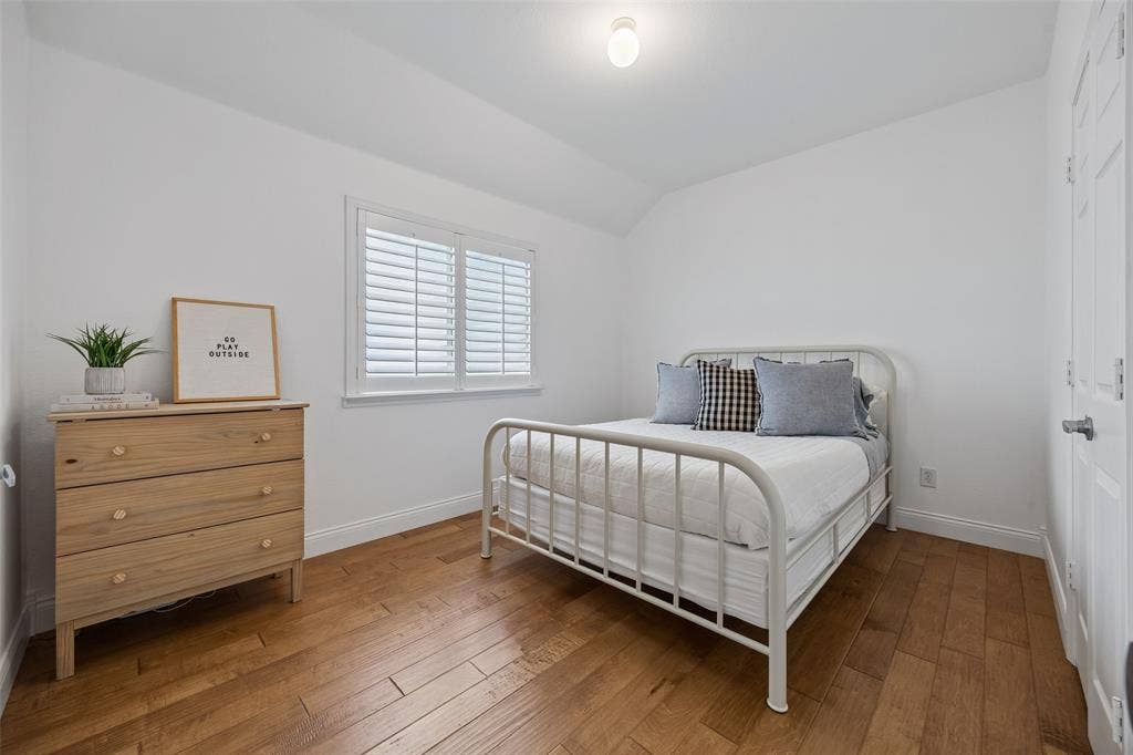9828 Meadow Rue Drive, McKinney, TX 75072 Bright secondary bedroom with flexible space for family, guests or a home office.