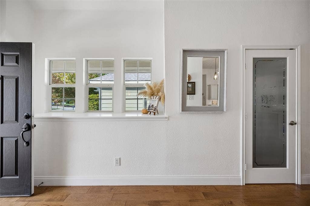 9828 Meadow Rue Drive, McKinney, TX 75072 I love this chic entry with window ledge and a fun pantry door this home has so much cute style!