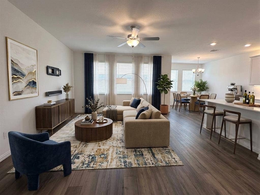 3308 Chasemoor Drive, Denton, TX 76207 Open-concept living area featuring wood-finish flooring, recessed lighting, and a ceiling fan with integrated lighting
