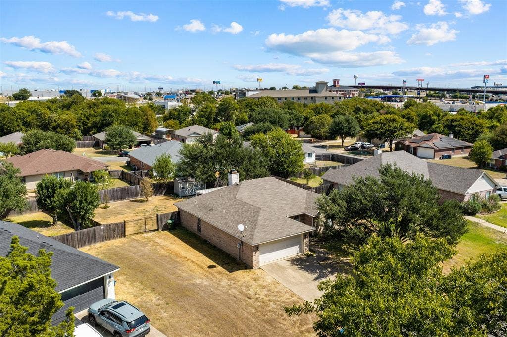 624 Willow Creek Drive, Hewitt, TX 76643 Single-story residence with an attached garage, featuring a shingled roof and brick exterior