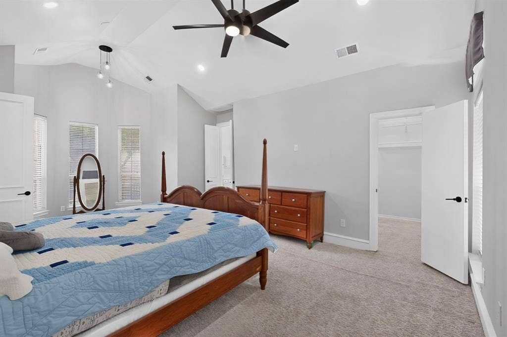 4237 McAlice Drive, Plano, TX 75093 Vaulted ceiling with a contemporary ceiling fan, recessed lighting, and a modern pendant light fixture