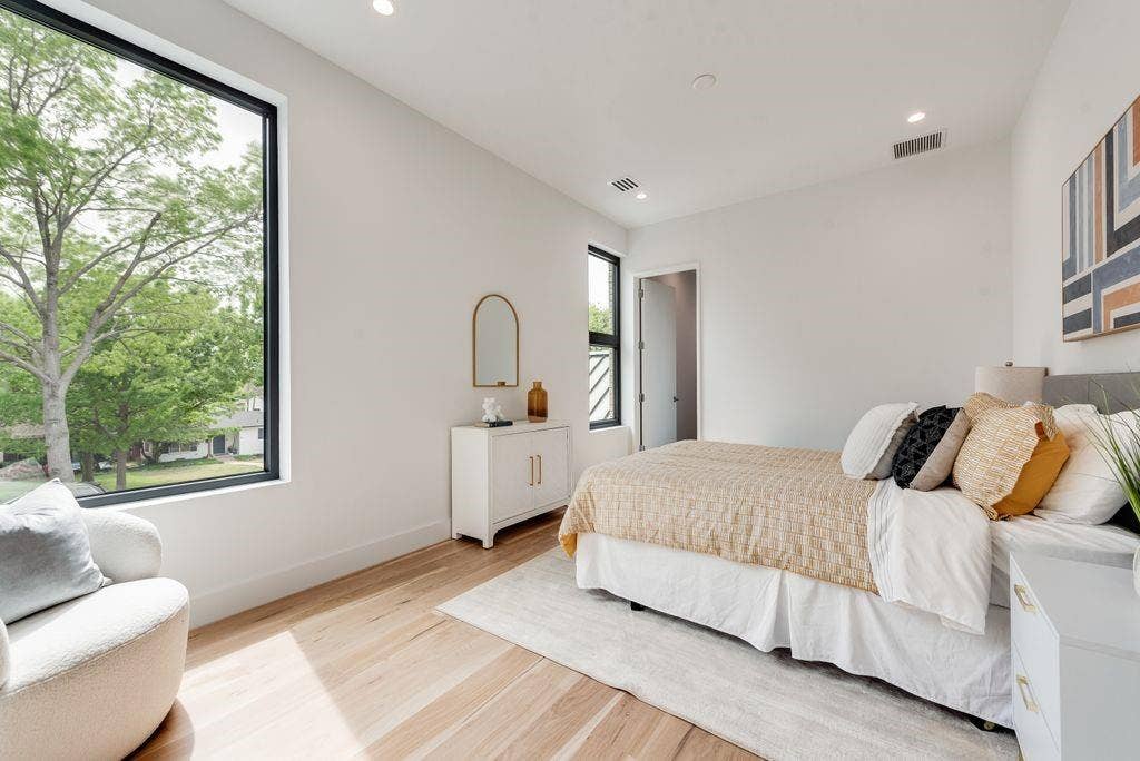 4103 Saranac Drive, Dallas, TX 75220 The second floor bedroom/guest suite offers a quiet and comfortable retreat overlooking huge yard and massive trees.