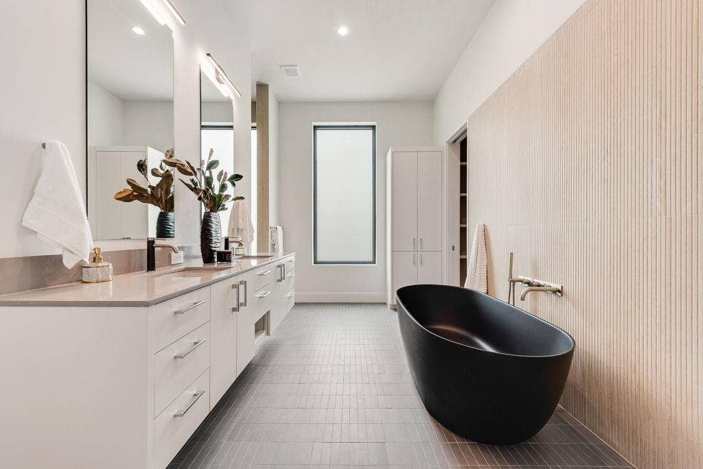 4103 Saranac Drive, Dallas, TX 75220 The spa-inspired bath features custom finishes and a calming, modern design.