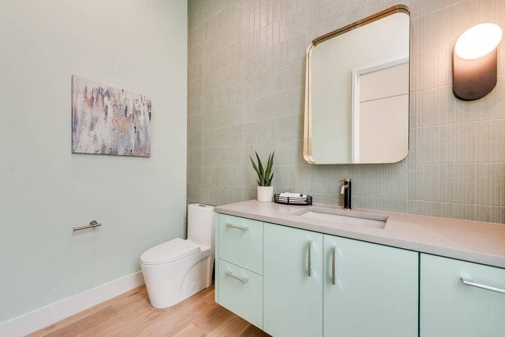 4103 Saranac Drive, Dallas, TX 75220 The powder bath is finished with elevated materials and a modern aesthetic.