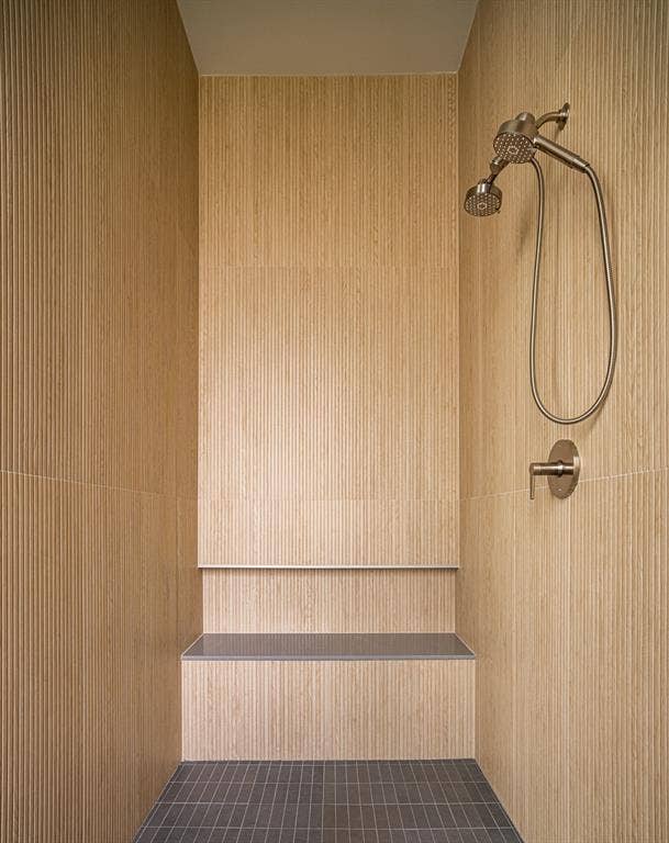 4103 Saranac Drive, Dallas, TX 75220 Oversized dual shower with ribbon tile, quartz bench and niche.