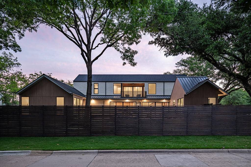 4103 Saranac Drive, Dallas, TX 75220 Custom horizontal cedar fence framing majestic trees and magnificent modern home