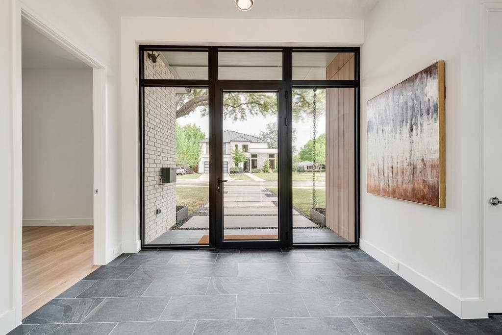 4103 Saranac Drive, Dallas, TX 75220 The foyer is filled with natural light, creating a calm and inviting first impression.