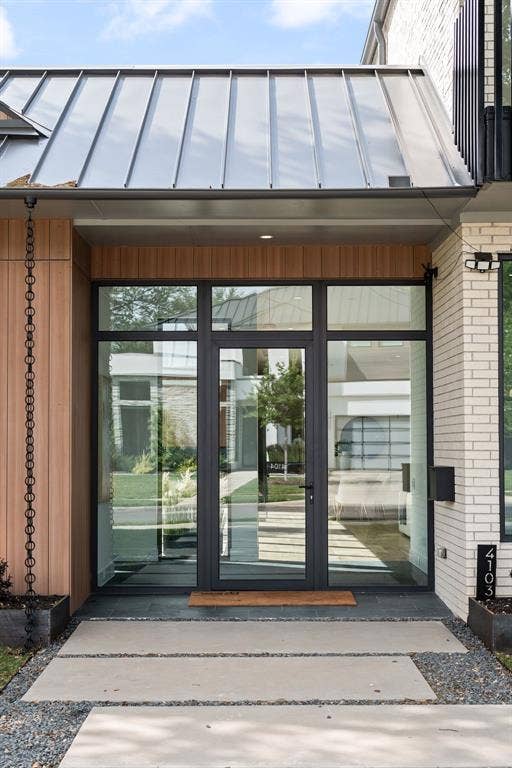 4103 Saranac Drive, Dallas, TX 75220 The covered entry welcomes you with clean lines and modern architectural detail.