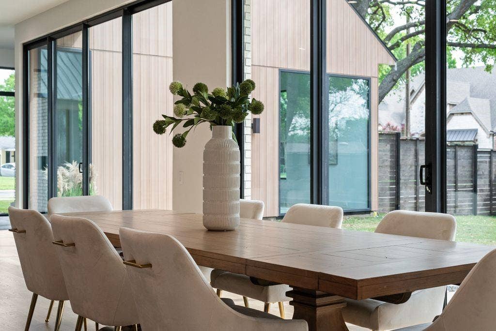 4103 Saranac Drive, Dallas, TX 75220 Surrounded by natural light, the dining area offers an inviting setting for both everyday living and entertaining.