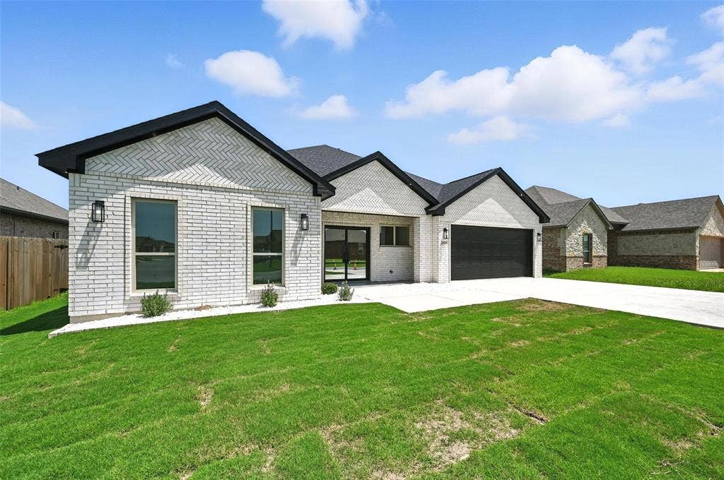 White brick exterior with black trim accents