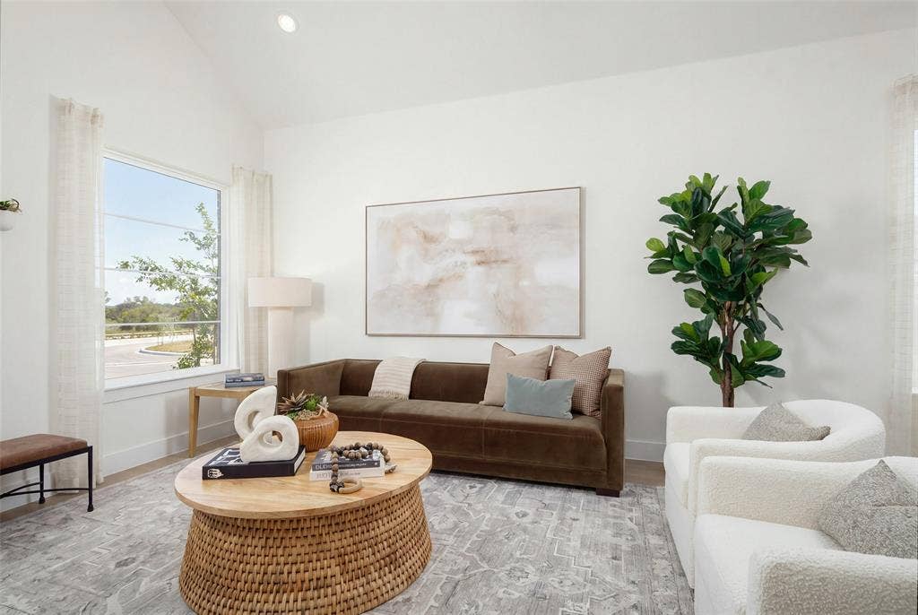 Vaulted ceilings complemented by recessed lighting
