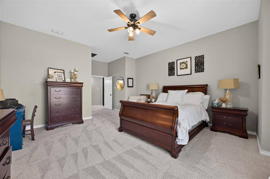225 Diamond Rose Drive, Burleson, TX 76028 Second primary suite at the front of the home, away from the main suite