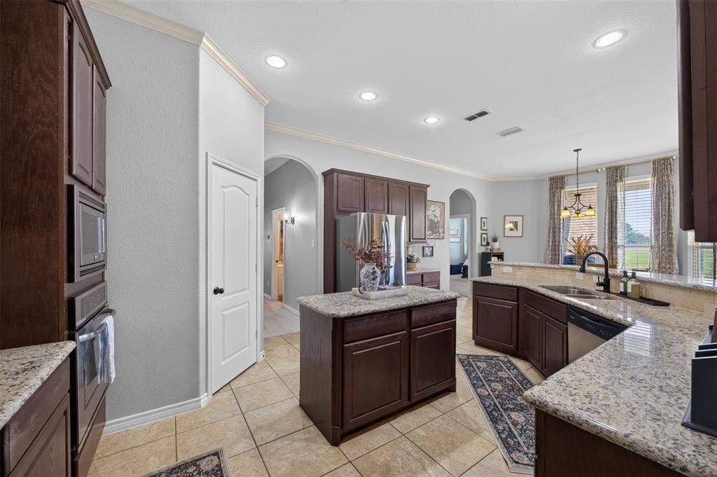 225 Diamond Rose Drive, Burleson, TX 76028 Granite kitchen with island and walk-in pantry