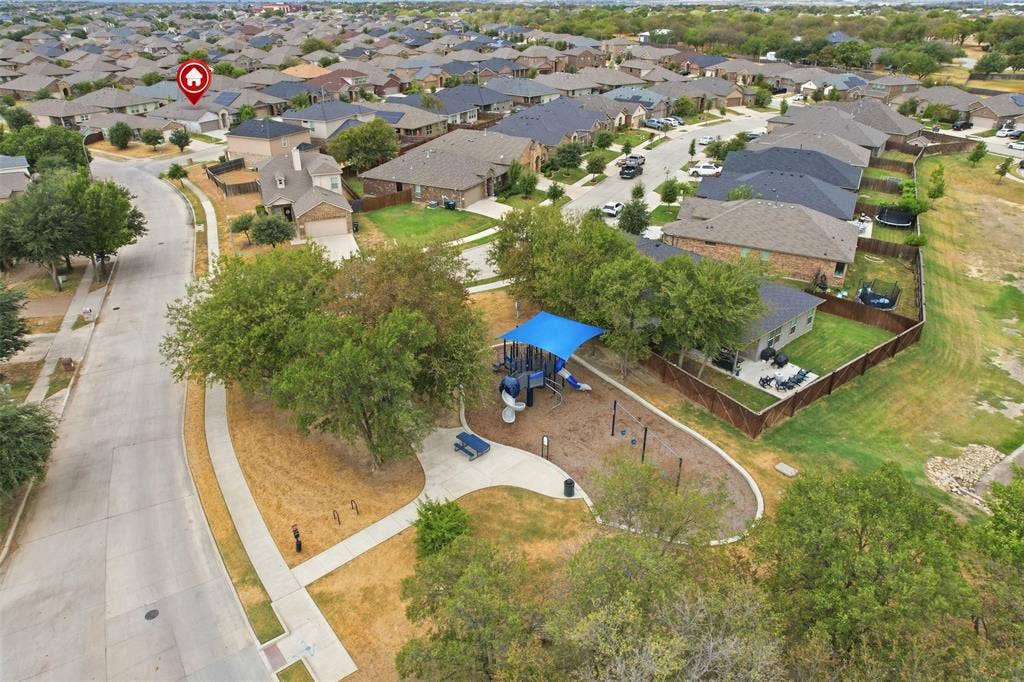 9005 Fescue Drive, Fort Worth, TX 76179 Residential street with sidewalks and streetlights