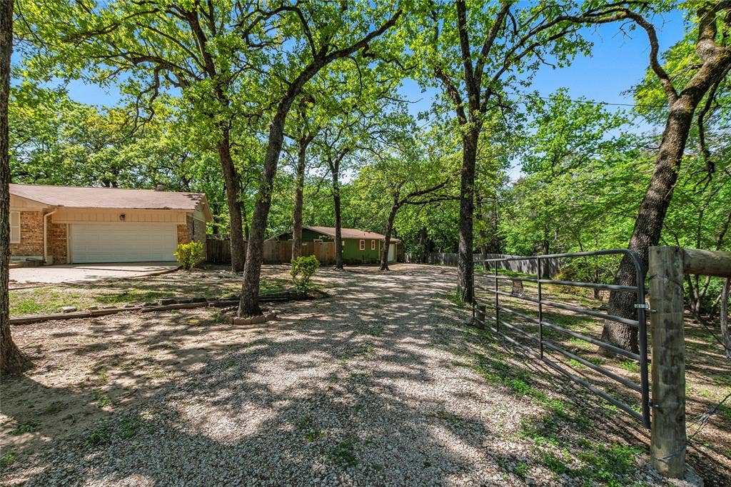 125 Harrell Street, Gun Barrel City, TX 75156 Private Driveway and gate to guesthouse