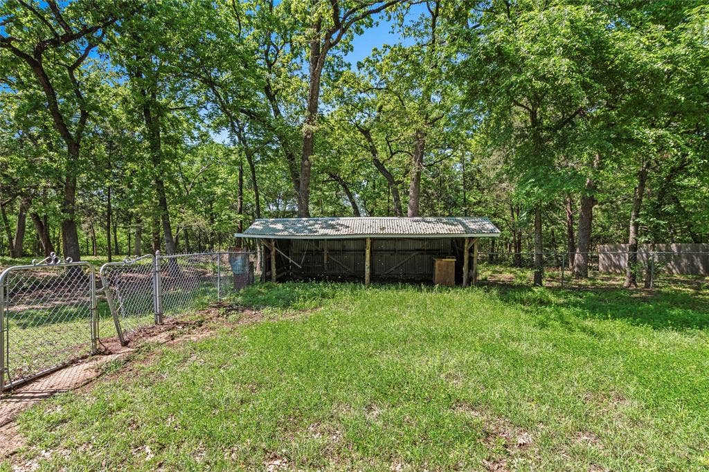 125 Harrell Street, Gun Barrel City, TX 75156 A second fenced area could be dog run, chicken coop or garden--use your imagination!