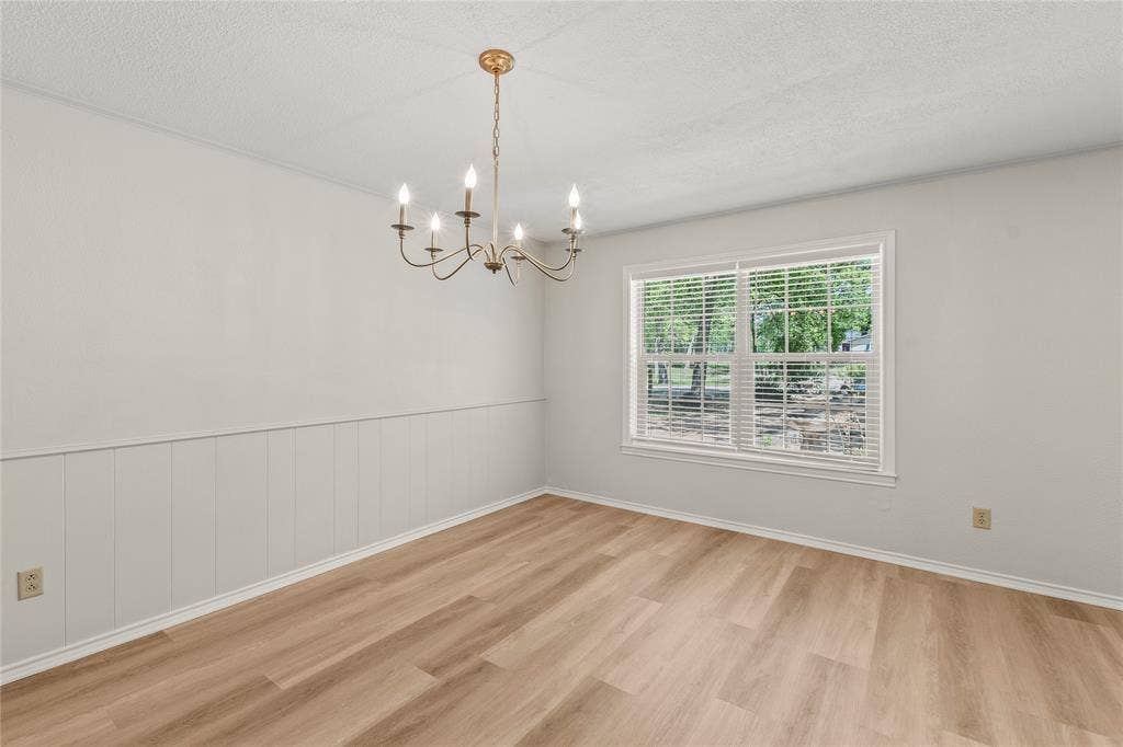 125 Harrell Street, Gun Barrel City, TX 75156 Formal dining room with luxury vinyl plank flooring