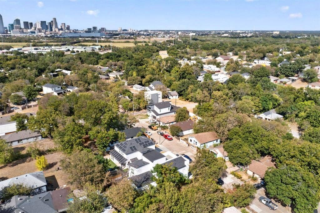 518 Crete Street, Dallas, TX 75203 Residential neighborhood with mature trees and a distant city skyline