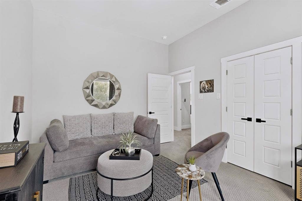 518 Crete Street, Dallas, TX 75203 Neutral wall color, white trim, white paneled doors, carpet flooring, and recessed lighting