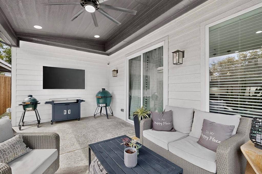 518 Crete Street, Dallas, TX 75203 Covered patio featuring a ceiling fan, recessed lighting, and a mounted flat-screen television