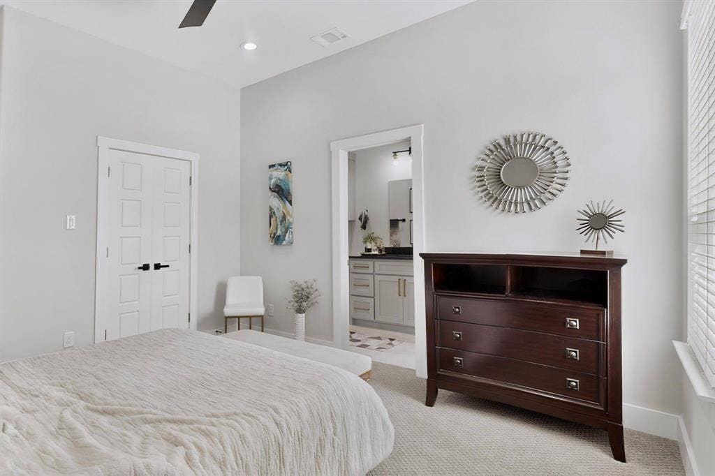 518 Crete Street, Dallas, TX 75203 Light-toned walls, vaulted ceiling, recessed lighting, and a ceiling fan