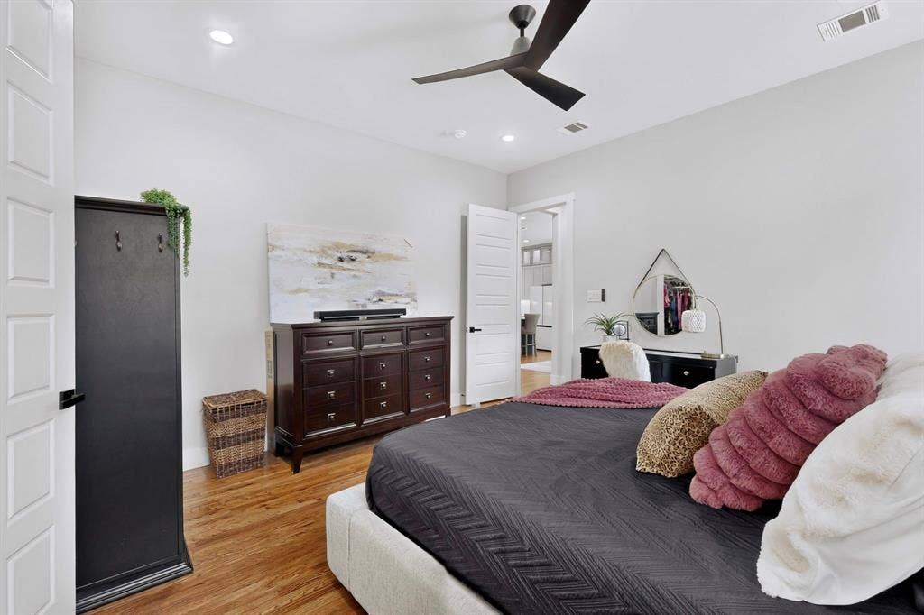 518 Crete Street, Dallas, TX 75203 Wood-finish flooring, recessed lighting, and a contemporary ceiling fan