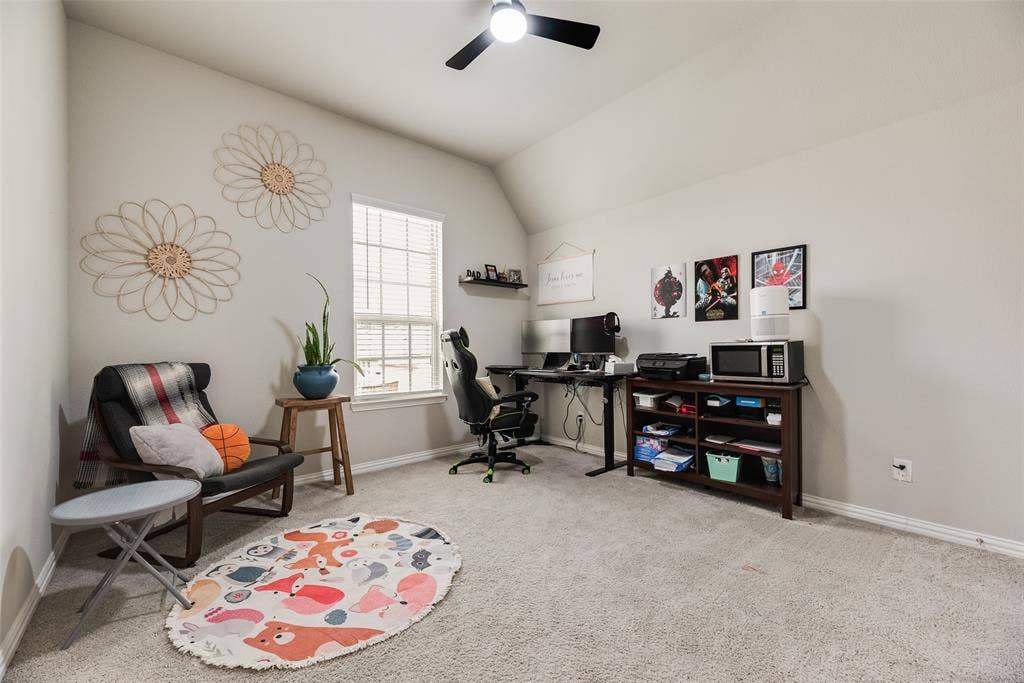 718 Waterbrook Parkway, Argyle, TX 76226 Sloped ceiling with a ceiling fan, window with blinds, and light gray wall paint