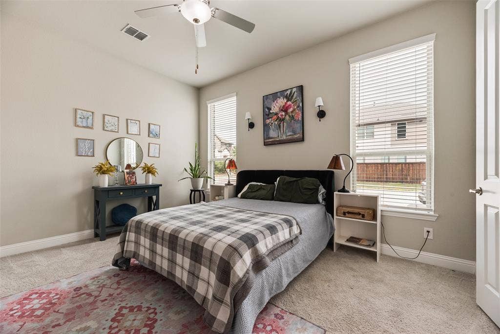 718 Waterbrook Parkway, Argyle, TX 76226 Recessed lighting, ceiling fan, carpet flooring, multiple windows with blinds, and a paneled door
