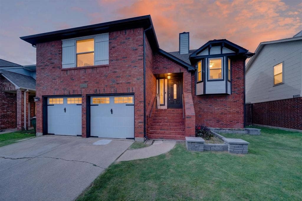 Brick exterior with a prominent bay window feature