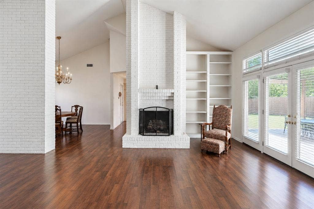 811 Ashford Court, Tyler, TX 75703 Floor to ceiling bookcases & fireplace with gas logs