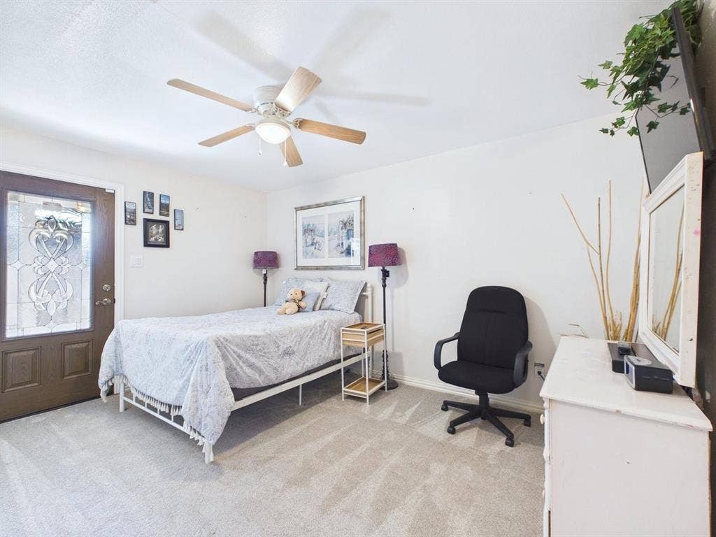 9335 Whittenburg Gate, Dallas, TX 75243 Neutral-toned carpeting throughout