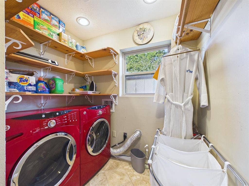 9335 Whittenburg Gate, Dallas, TX 75243 Built-in shelving, corner window, recessed lighting, and a clothes hanging rod