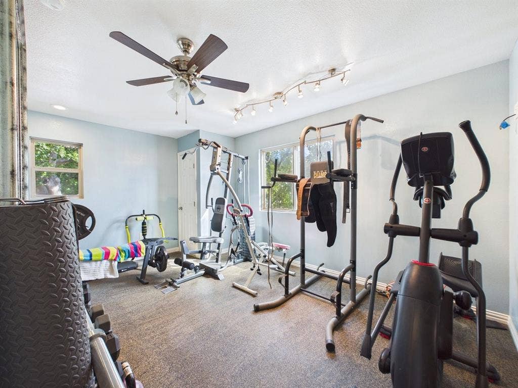 9335 Whittenburg Gate, Dallas, TX 75243 Recessed lighting, ceiling fan, and track lighting provide ample illumination