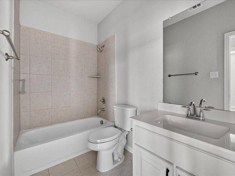 White vanity with integrated rectangular sink and polished chrome faucet