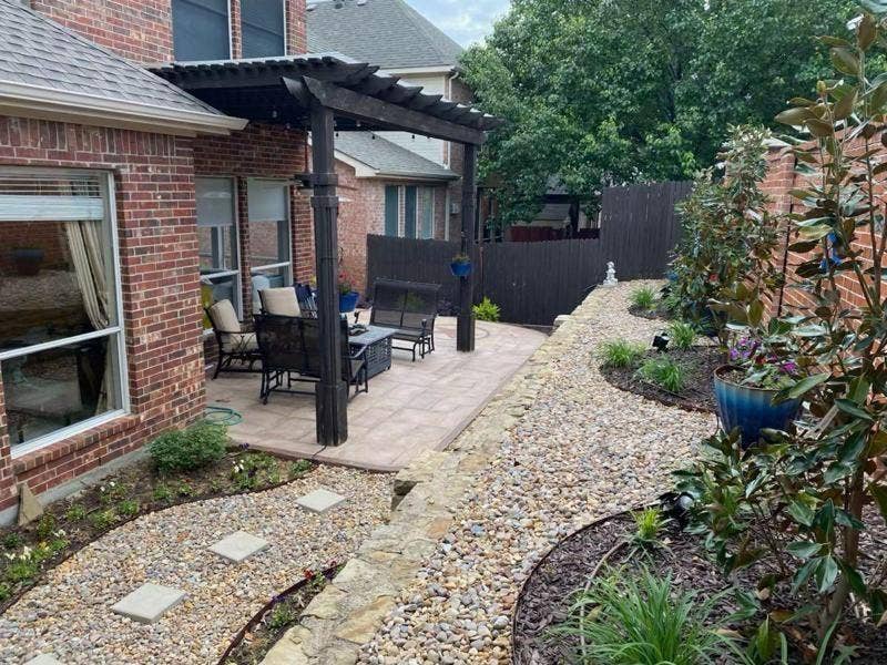 2917 Waterford Drive, Irving, TX 75063 Brick exterior with an attached pergola and paver patio