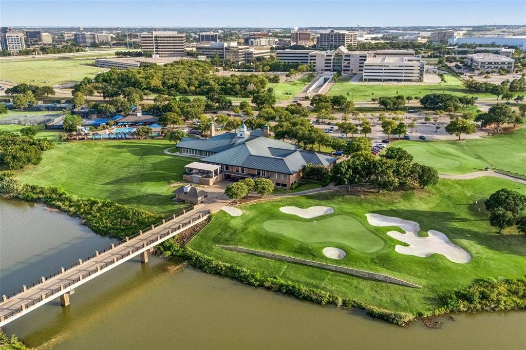 2917 Waterford Drive, Irving, TX 75063 Golf course with green fairways, sand traps, and a putting green