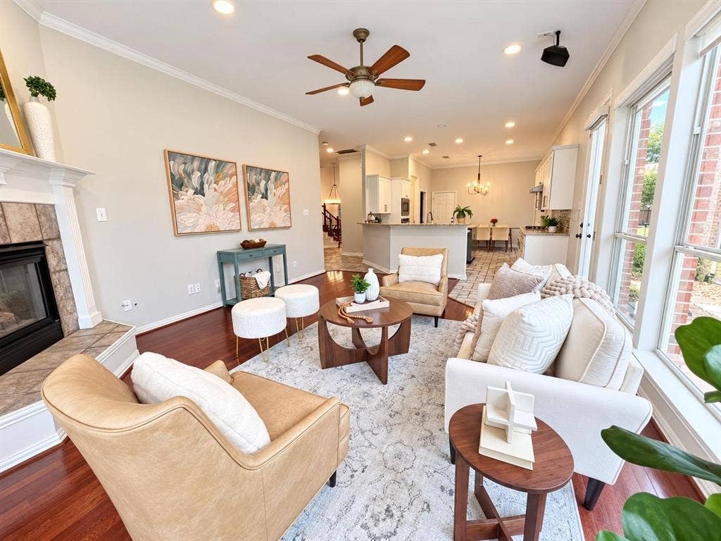2917 Waterford Drive, Irving, TX 75063 Open-concept living space featuring wood-finish flooring, a ceiling fan, recessed lighting, and large windows