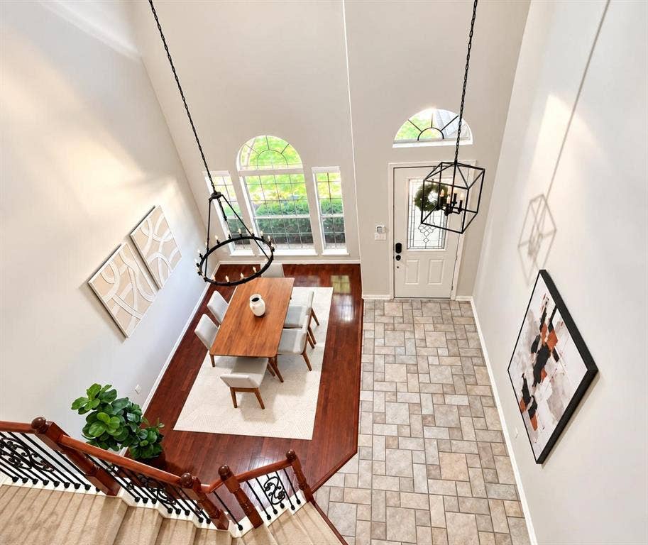 2917 Waterford Drive, Irving, TX 75063 Two-story foyer with a vaulted ceiling, arch-top windows, and a decorative front door