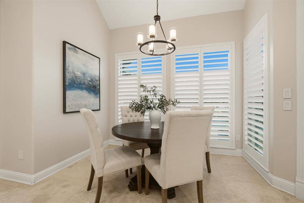 1120 Twin Oaks Drive, Prosper, TX 75078 The breakfast nook is a bright, inviting space for morning coffee or casual meals. Plantation shutters with hidden title rods grace the picture windows ~ all facing the swimming pool & lushly landscaped yard.